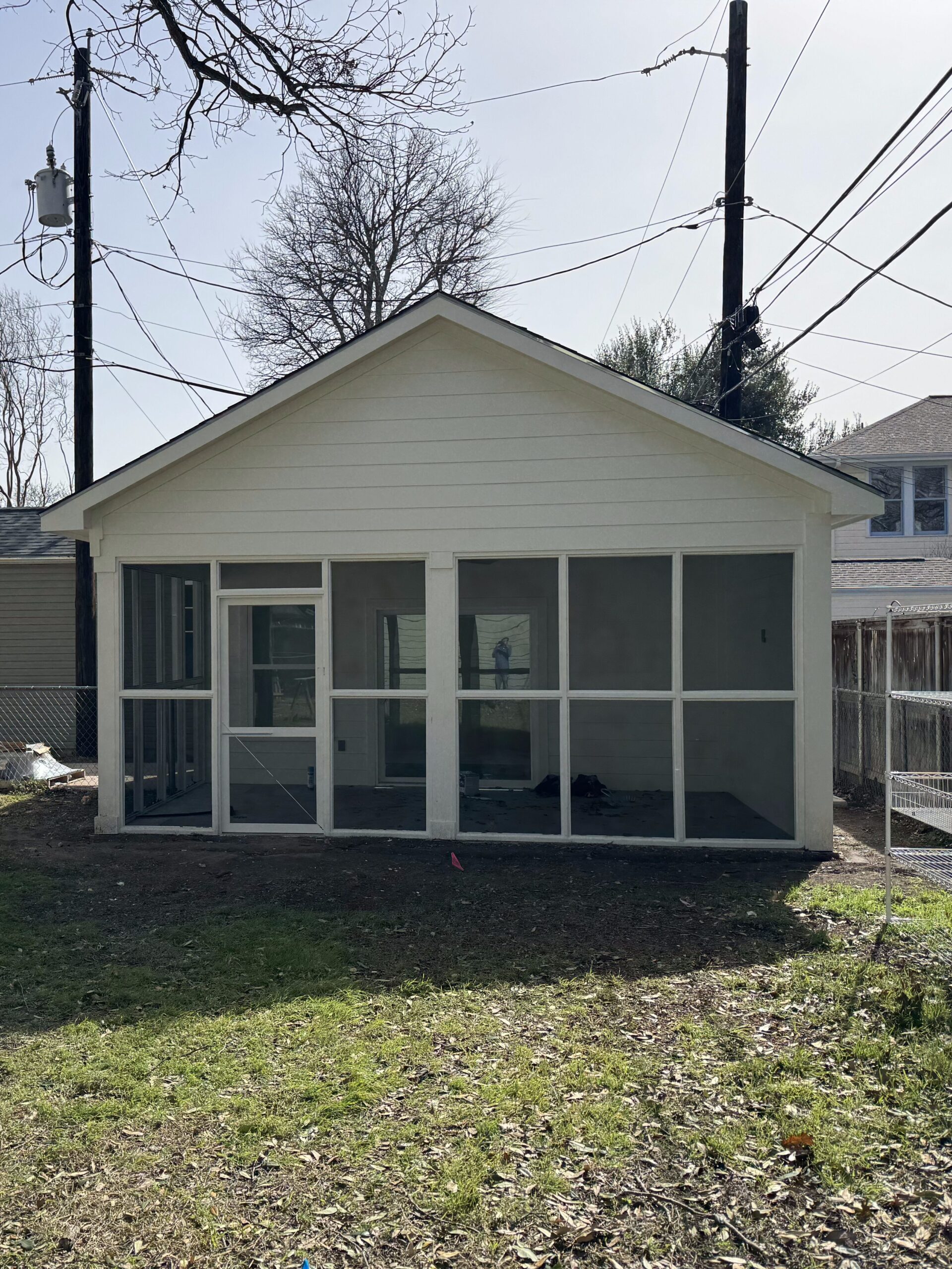Williamson County home addition with finished flooring, trim work, windows, and French doors
