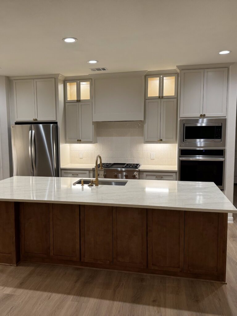 Austin home renovation with updated cabinets, bathroom finishes, and new flooring after remodel