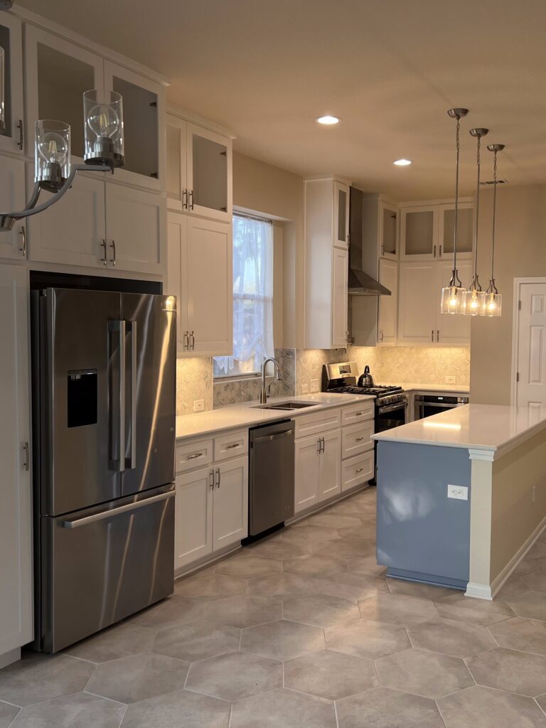 Legend Oaks Austin kitchen remodel after photo with updated cabinets, countertops, backsplash, and interior finishes