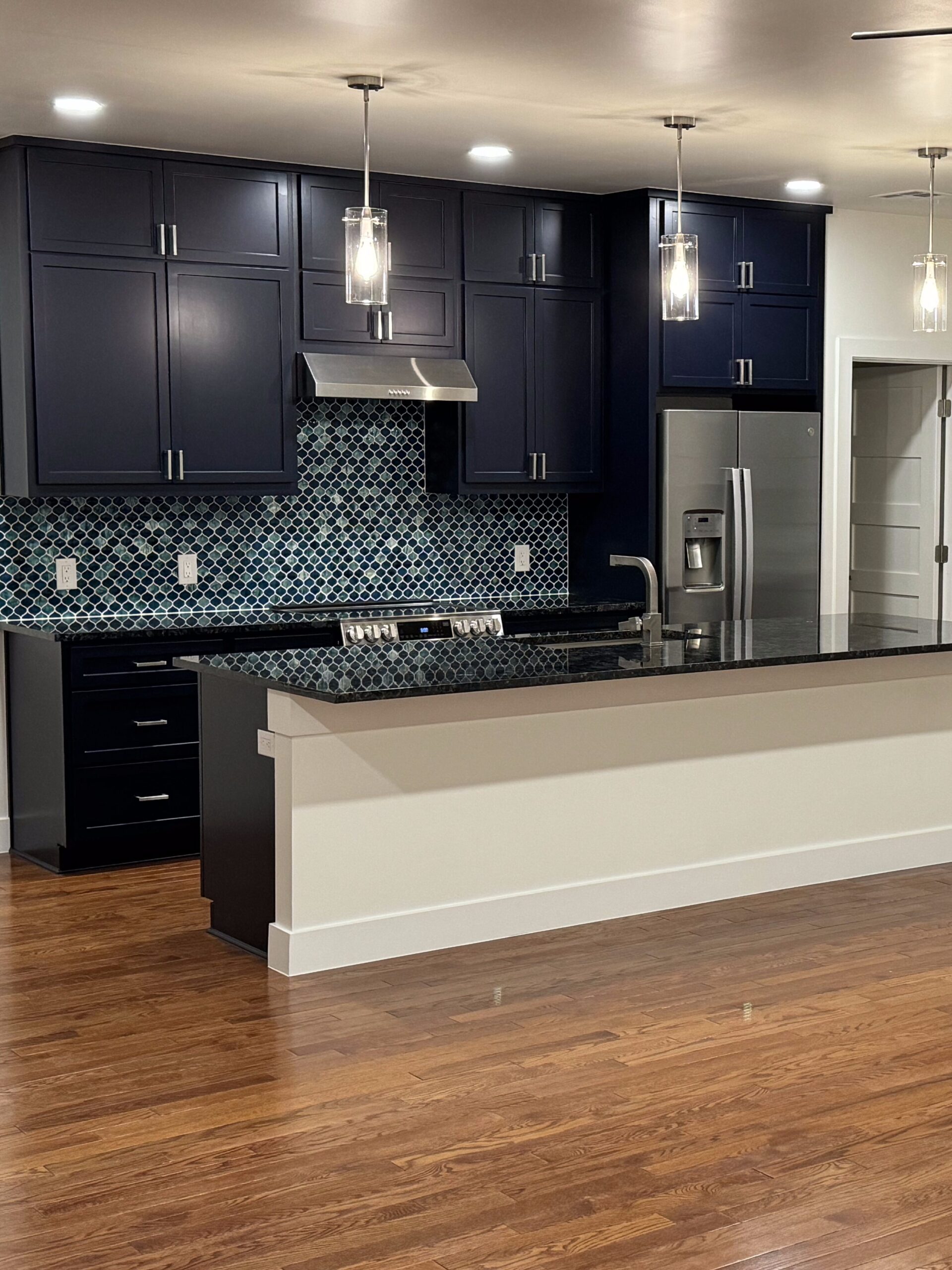 Driftwood kitchen remodel with updated cabinets, countertops, flooring, and interior finish work
