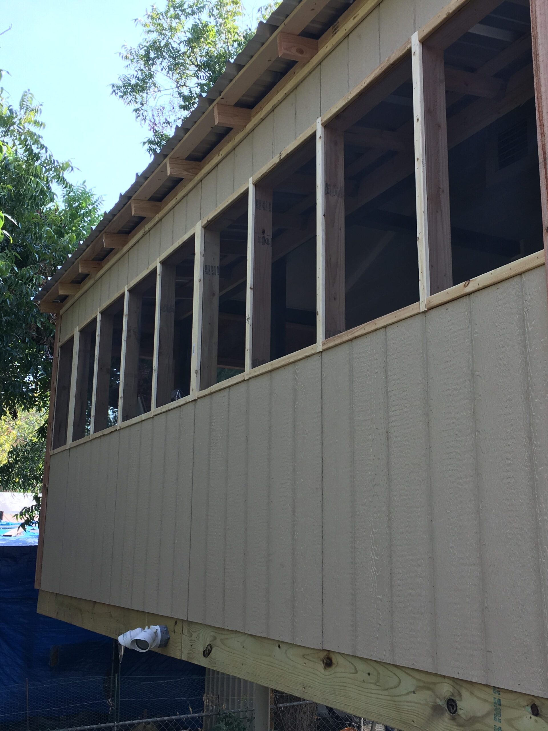Lake LBJ patio addition with exterior stairs, deck framing, and exterior carpentry