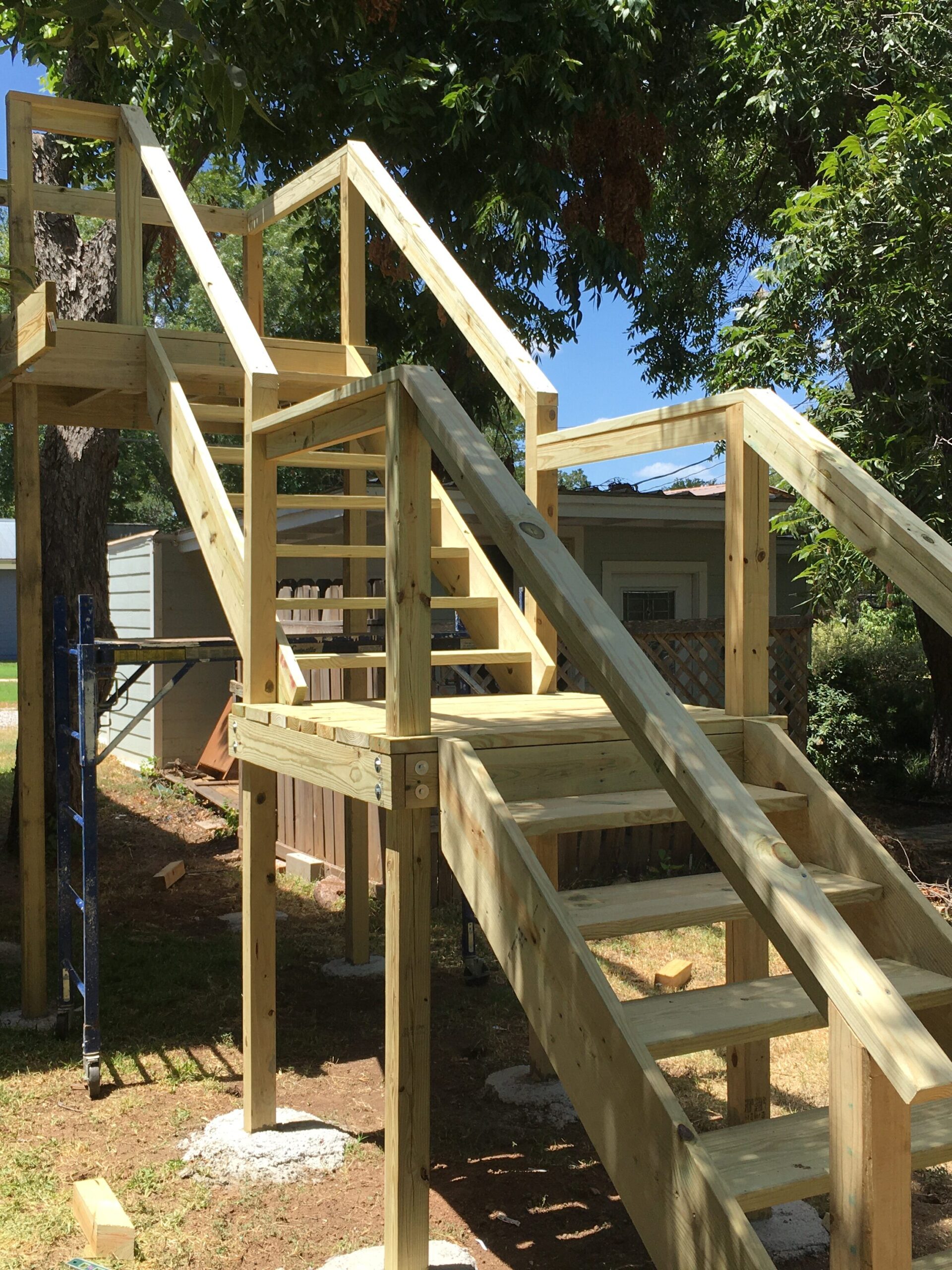 Lake Lyndon B. Johnson Hill Country patio addition with exterior stairs, deck framing, and exterior carpentry