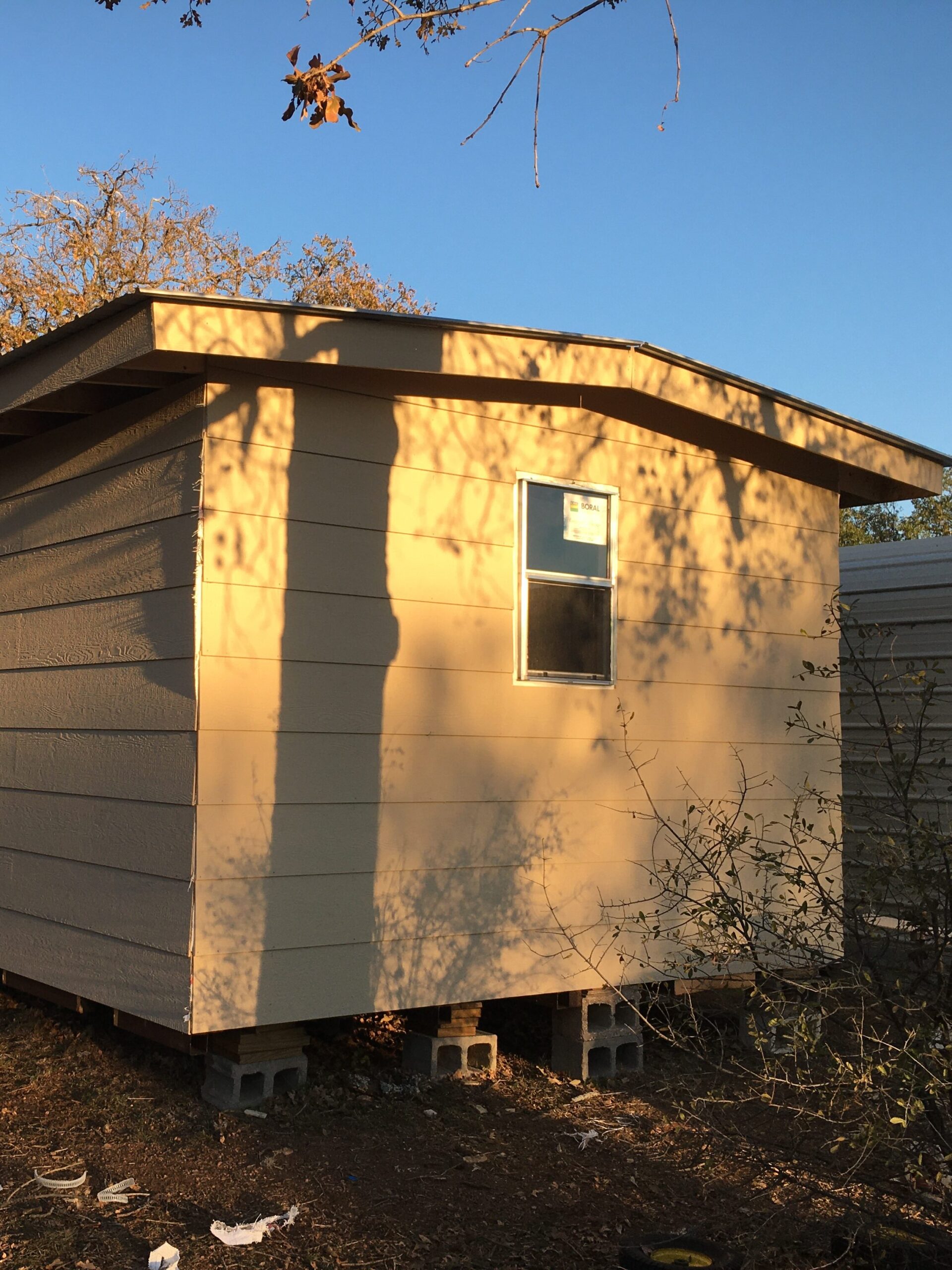 Kyle storage shed build with framing, siding, and exterior carpentry