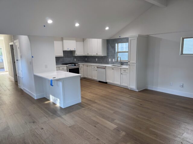 Bouldin Austin whole house remodel after load-bearing wall removal with updated kitchen and open layout