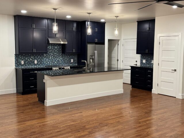 Driftwood kitchen remodel with updated cabinets, countertops, flooring, and interior finish work